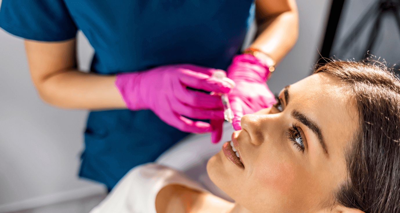 Woman getting dermal fillers in coventry at a skin clinic